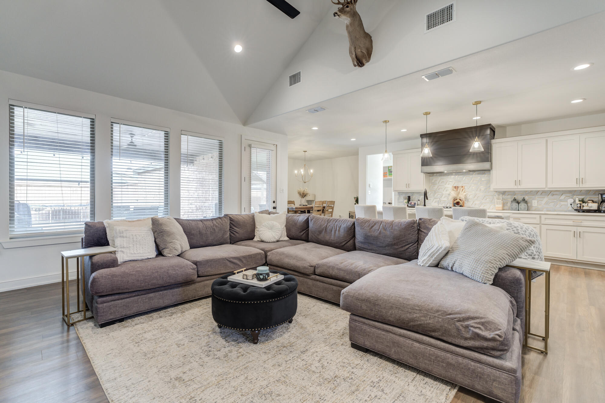 4624 139th Street Lubbock, TX 79424 - Photo 11 of 52 a living room with furniture and a large window
