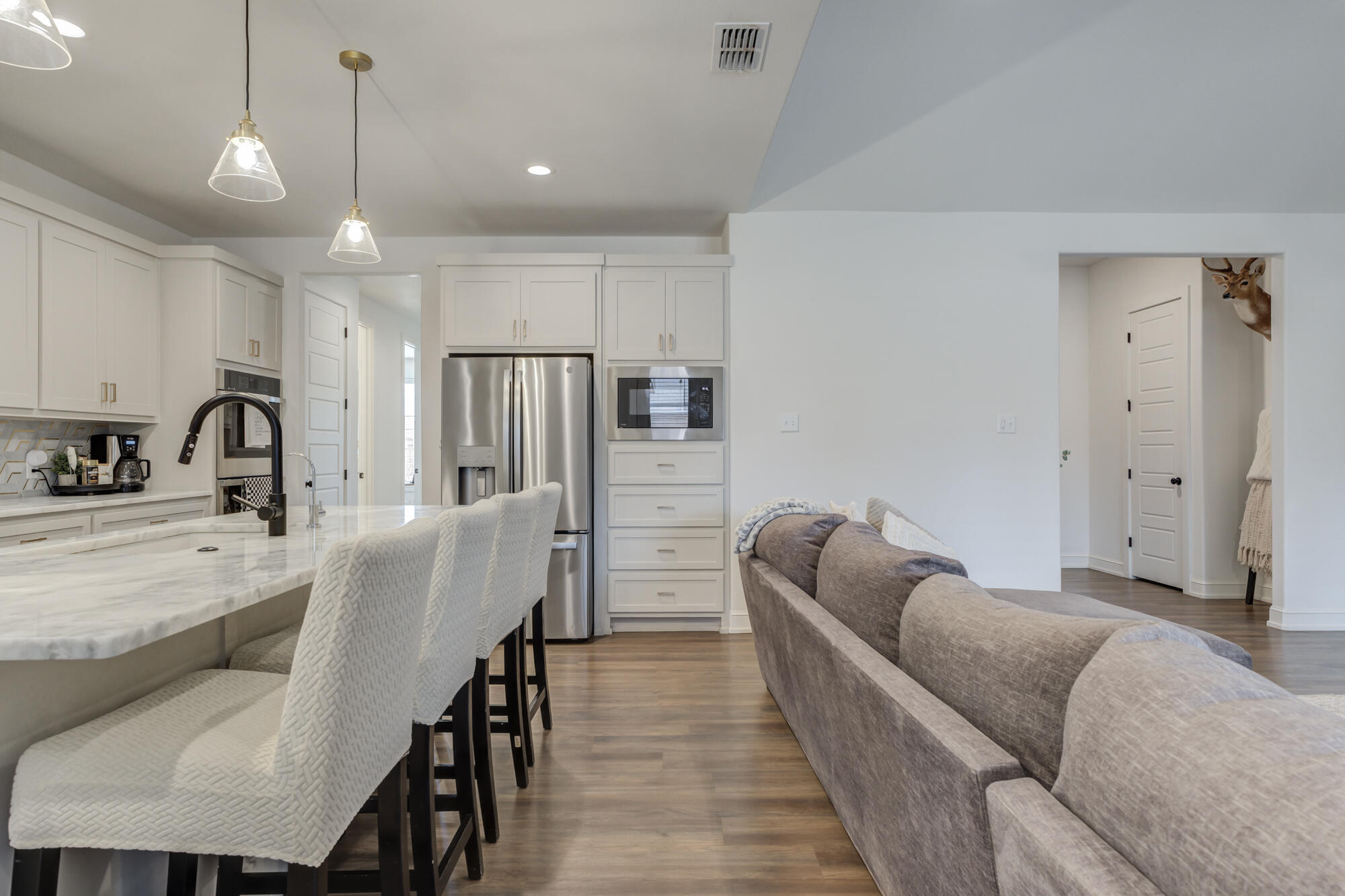 4624 139th Street Lubbock, TX 79424 - Photo 17 of 52 a dining room with furniture and a chandelier