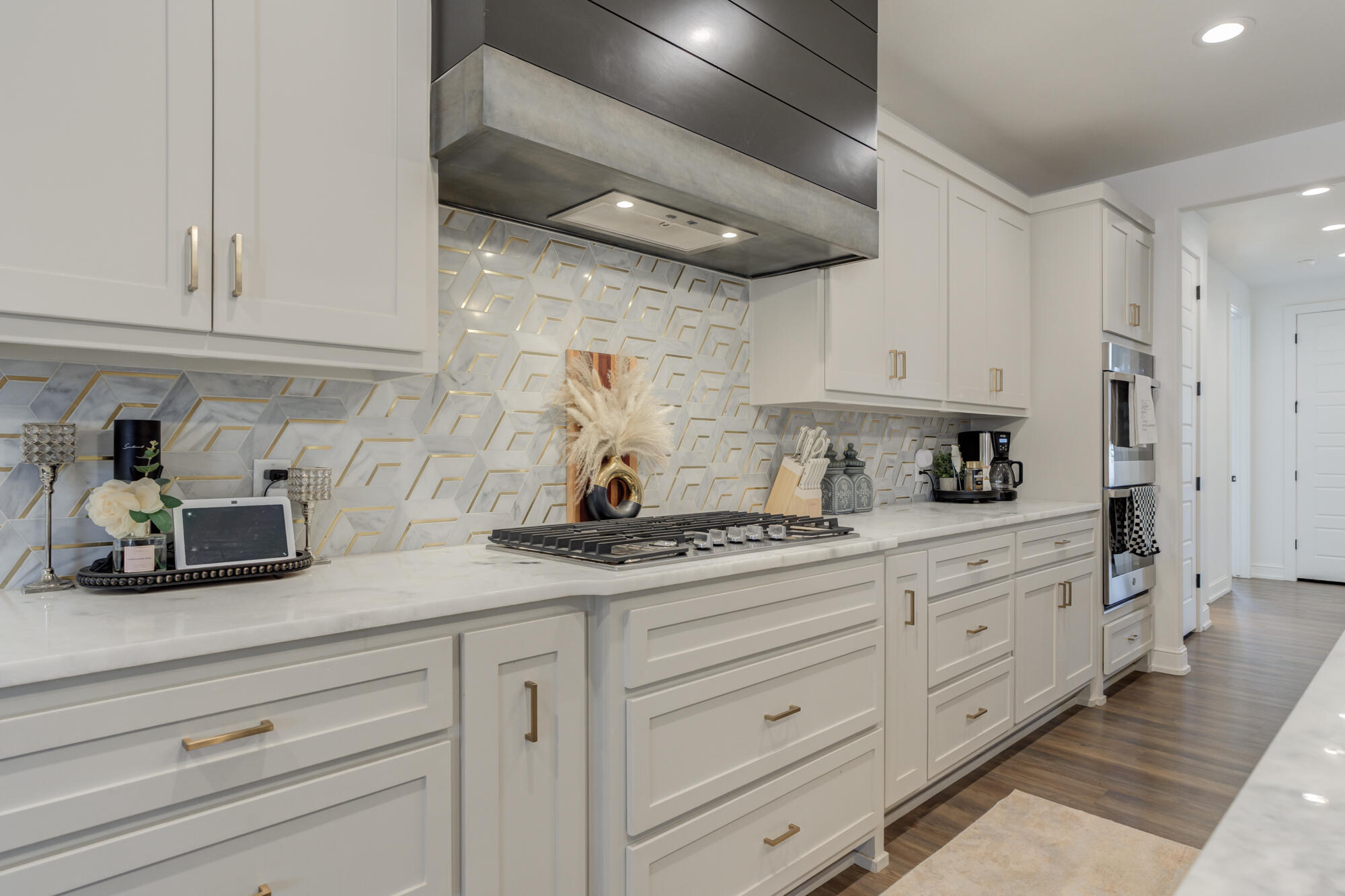 4624 139th Street Lubbock, TX 79424 - Photo 21 of 52 a kitchen with granite countertop white cabinets and white stainless steel appliances