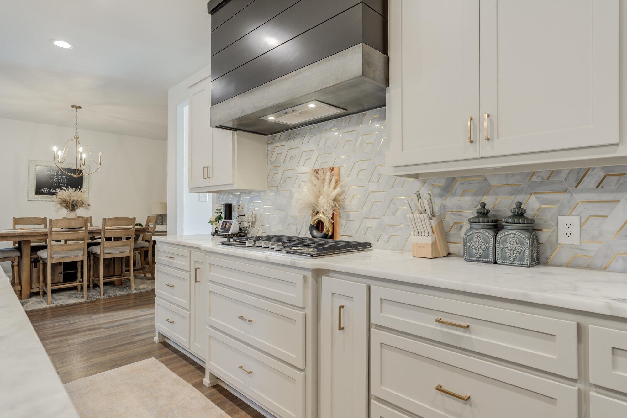 4624 139th Street Lubbock, TX 79424 - Photo 25 of 52 a kitchen with sink cabinets and stove