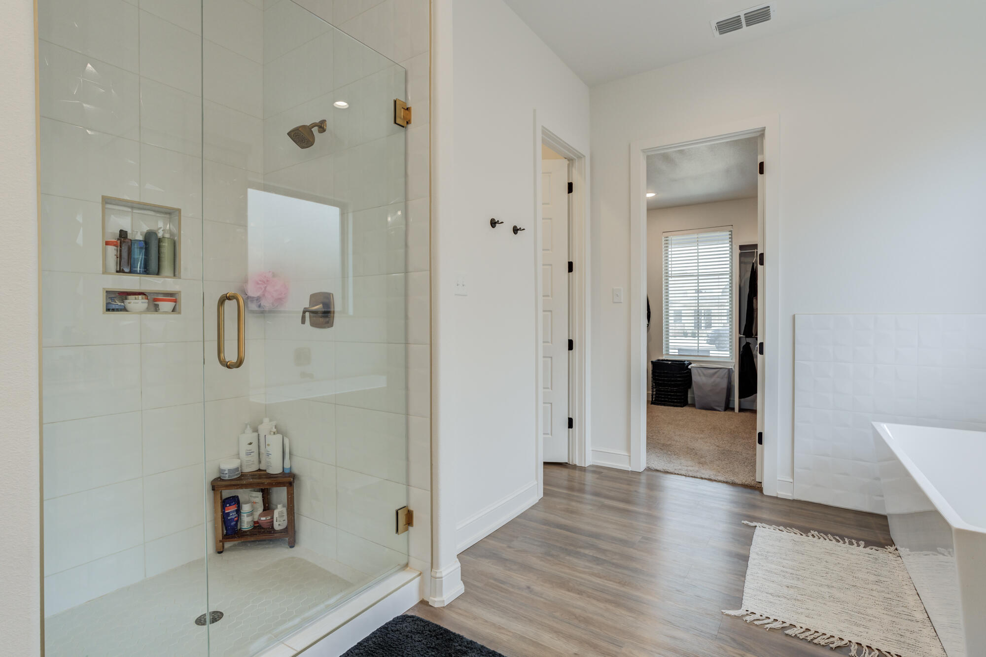 4624 139th Street Lubbock, TX 79424 - Photo 31 of 52 a hallway with wooden floor and closet