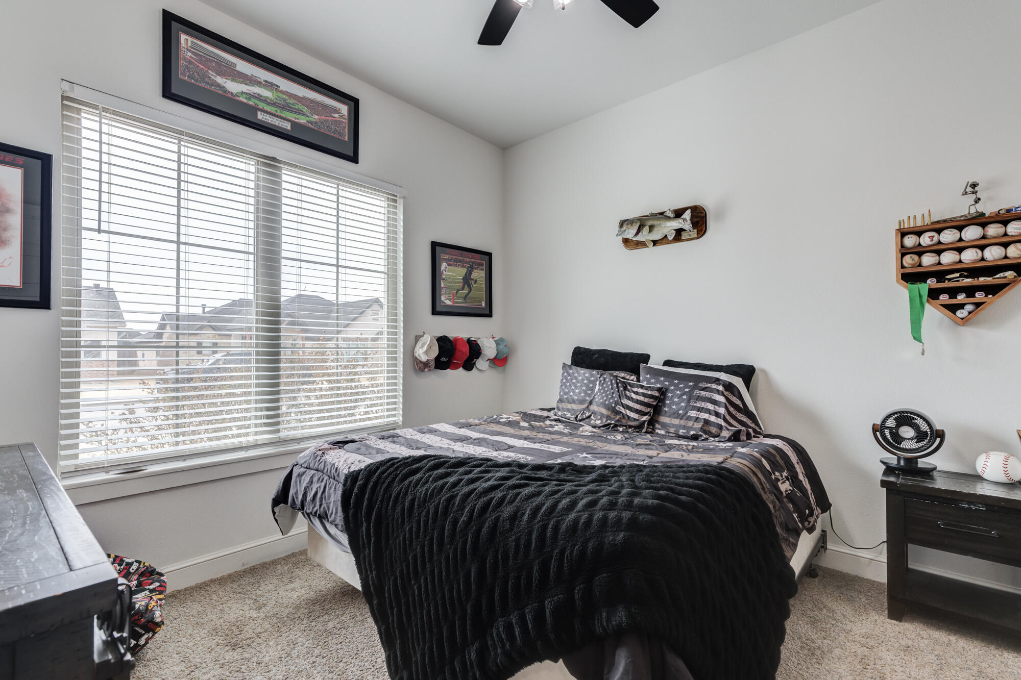 4624 139th Street Lubbock, TX 79424 - Photo 43 of 52 a bedroom with bed and a window
