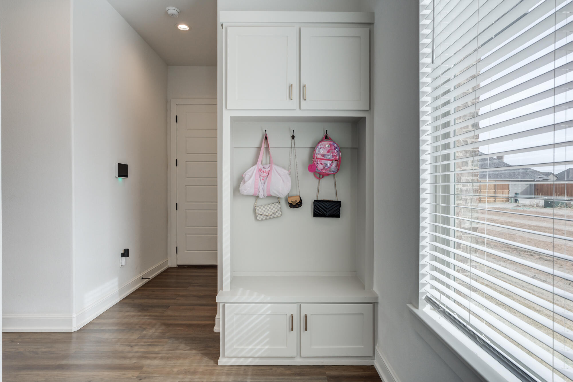 4624 139th Street Lubbock, TX 79424 - Photo 48 of 52 a view of an entryway with wooden floor