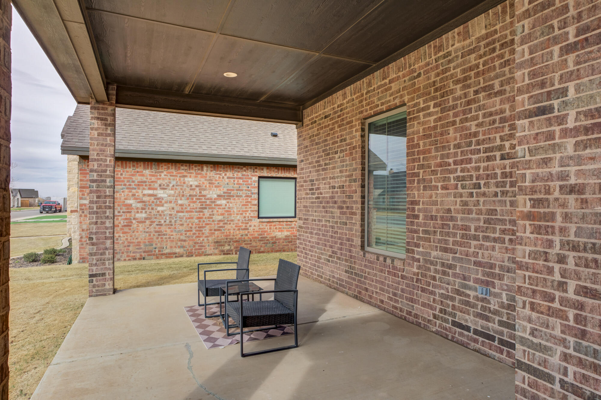 4624 139th Street Lubbock, TX 79424 - Photo 7 of 52 a balcony with furniture and a gate