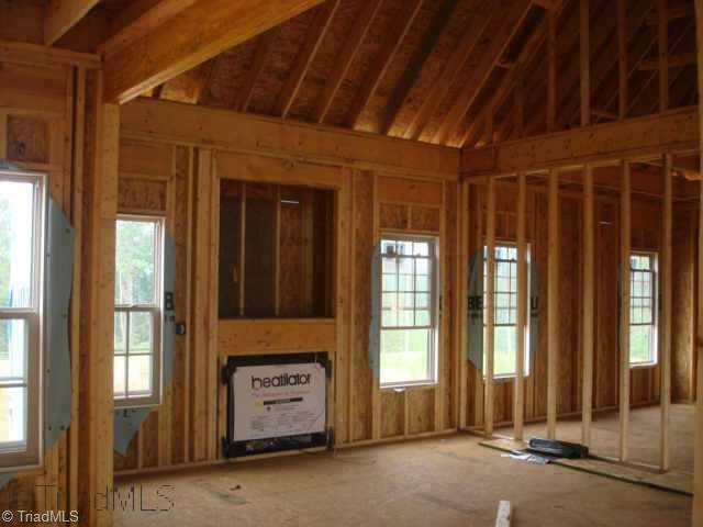 48 The Bluffs Rural Hall, NC 27045 - Photo 4 of 9 Other. The vaulted Great Room with gas logs flows perfectly from the Kitchen with a Breakfast area and forward to the Formal Dining. Imagine your belongings in this beautiful new home.
