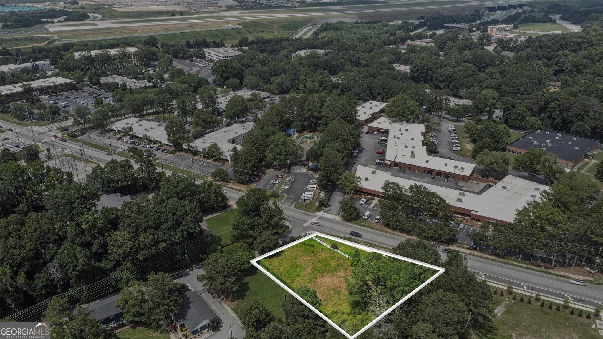 0 West Fayetteville Road Atlanta, GA 30349 - Photo 11 of 18 an aerial view of a house with a yard