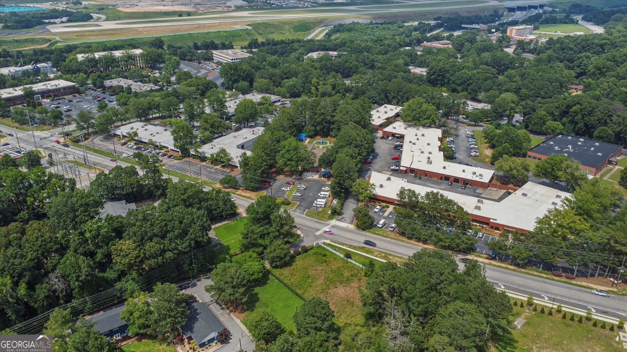 0 West Fayetteville Road Atlanta, GA 30349 - Photo 12 of 18 an aerial view of residential house with outdoor space and swimming pool