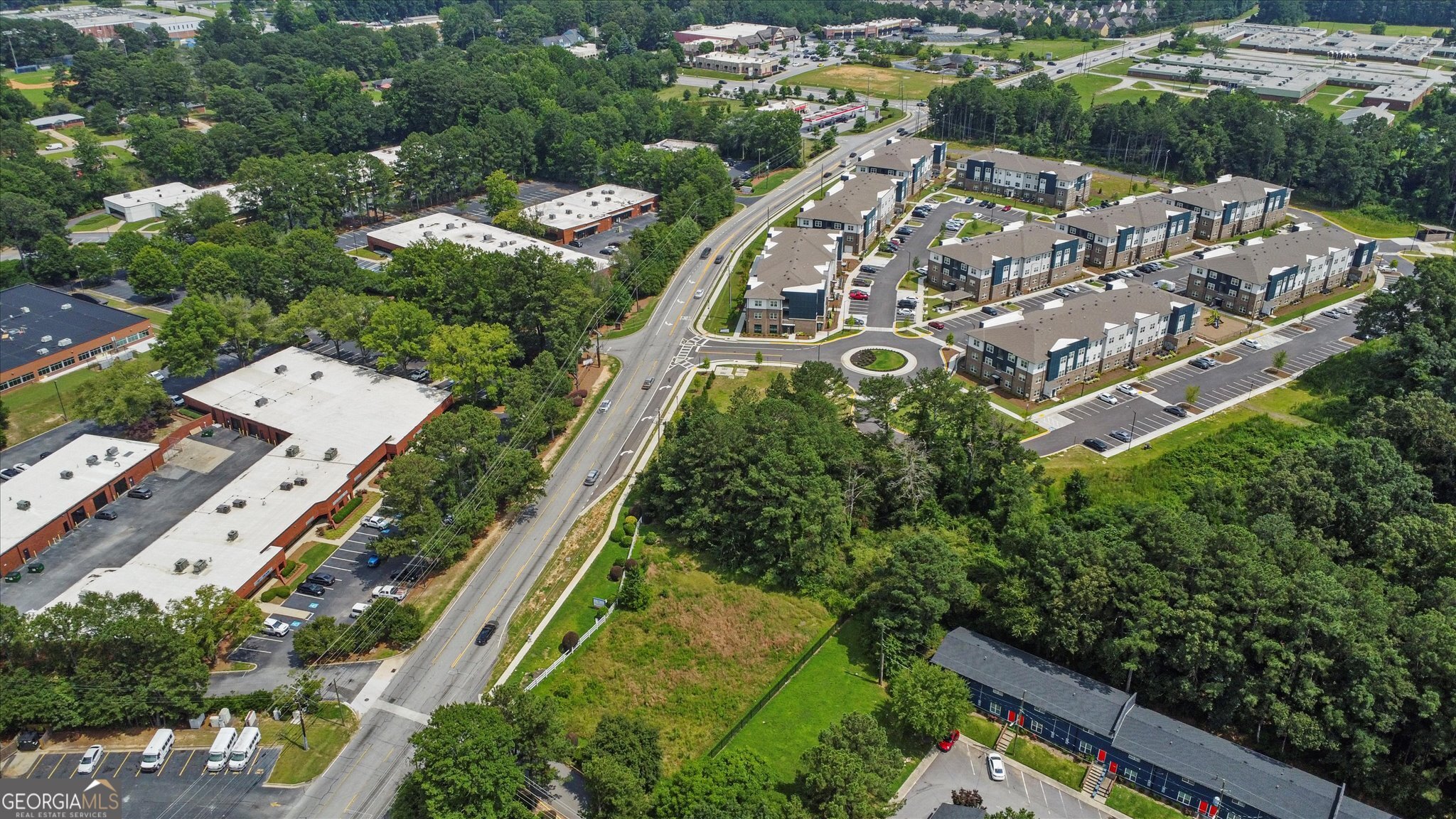 0 West Fayetteville Road Atlanta, GA 30349 - Photo 16 of 18 an aerial view of residential houses with outdoor space