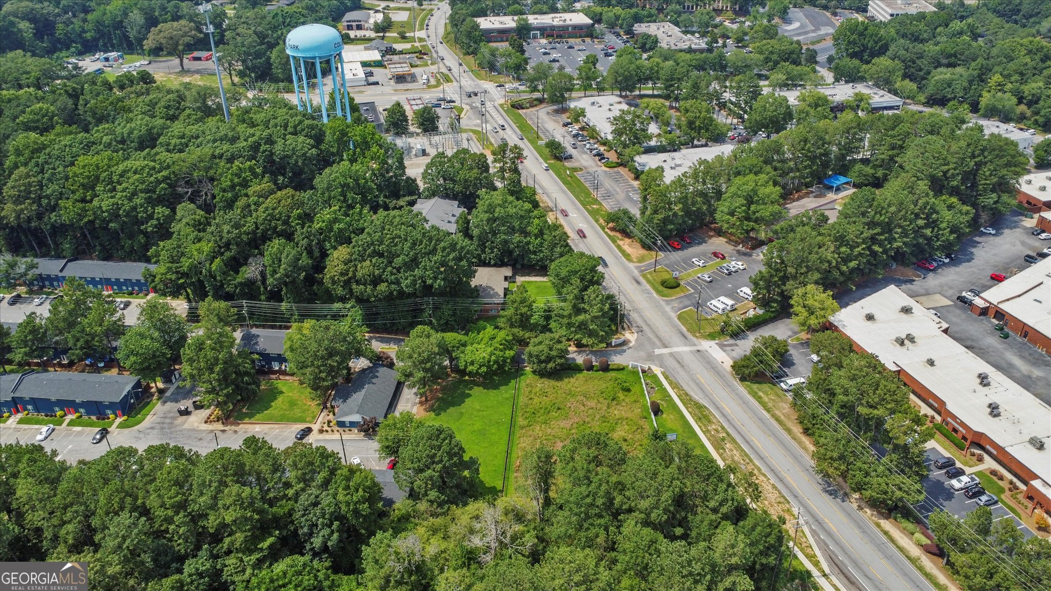 0 West Fayetteville Road Atlanta, GA 30349 - Photo 18 of 18 an aerial view of residential houses with outdoor space and street view