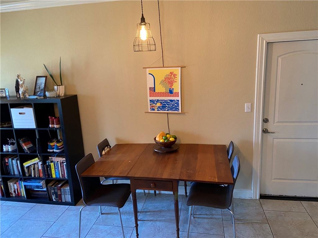 5404 Helen Street Austin, TX 78751 - Photo 4 of 7 Dining area featuring light tile patterned floors
