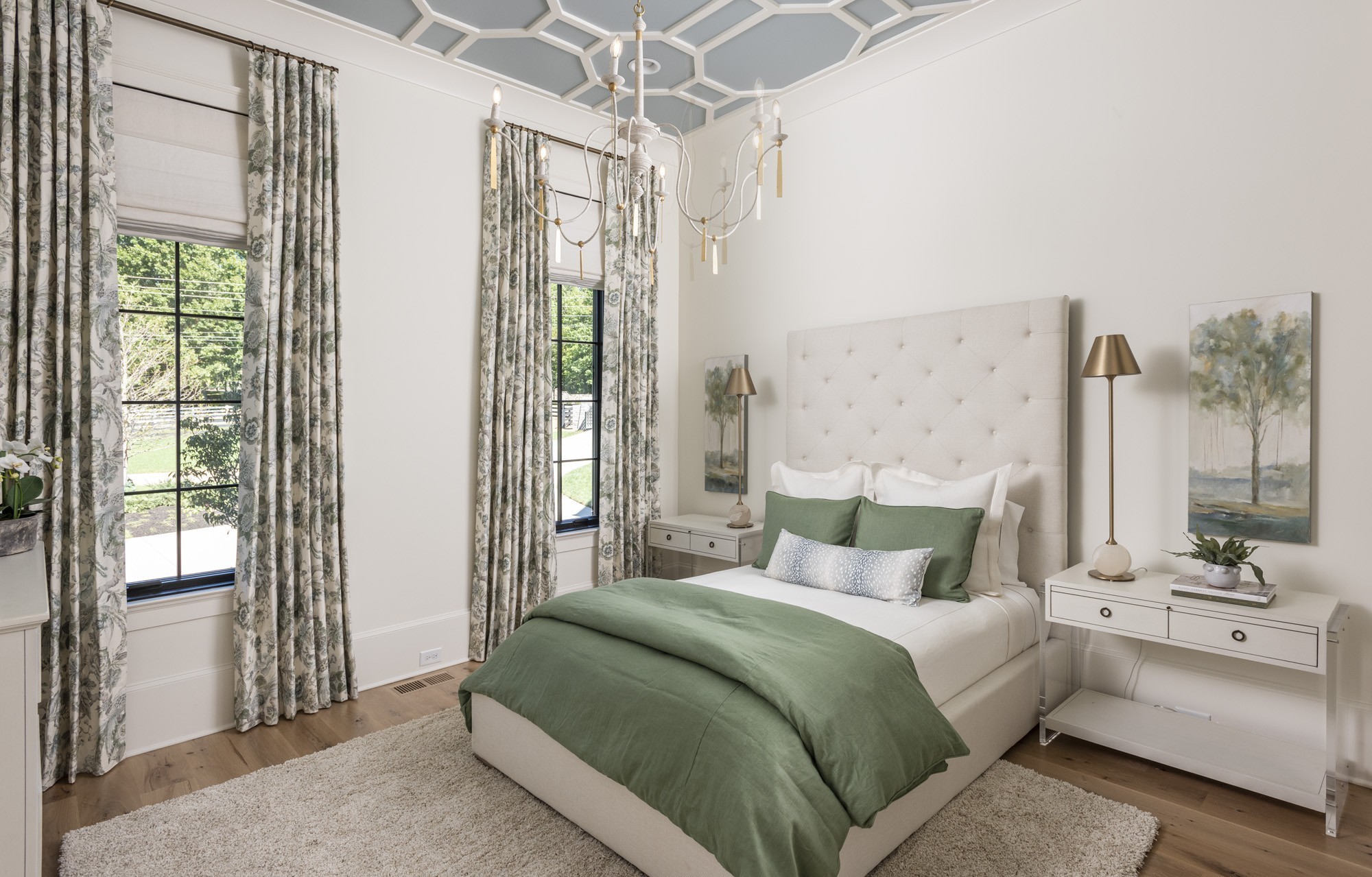 1561 Sunset Road Brentwood, TN 37027 - Photo 29 of 56 a bedroom with a large bed and a chandelier