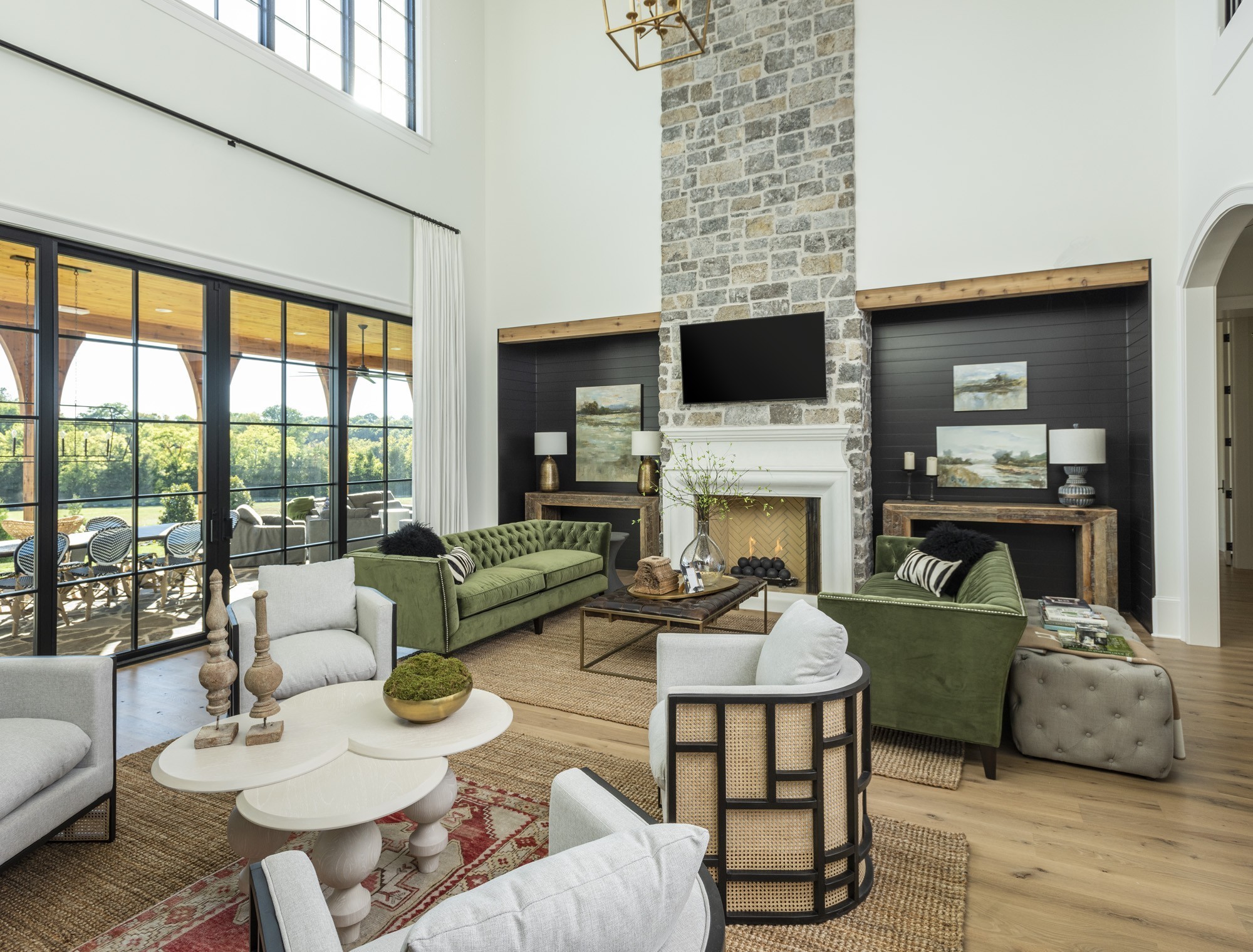 1561 Sunset Road Brentwood, TN 37027 - Photo 10 of 56 a living room with furniture a flat screen tv and a fireplace