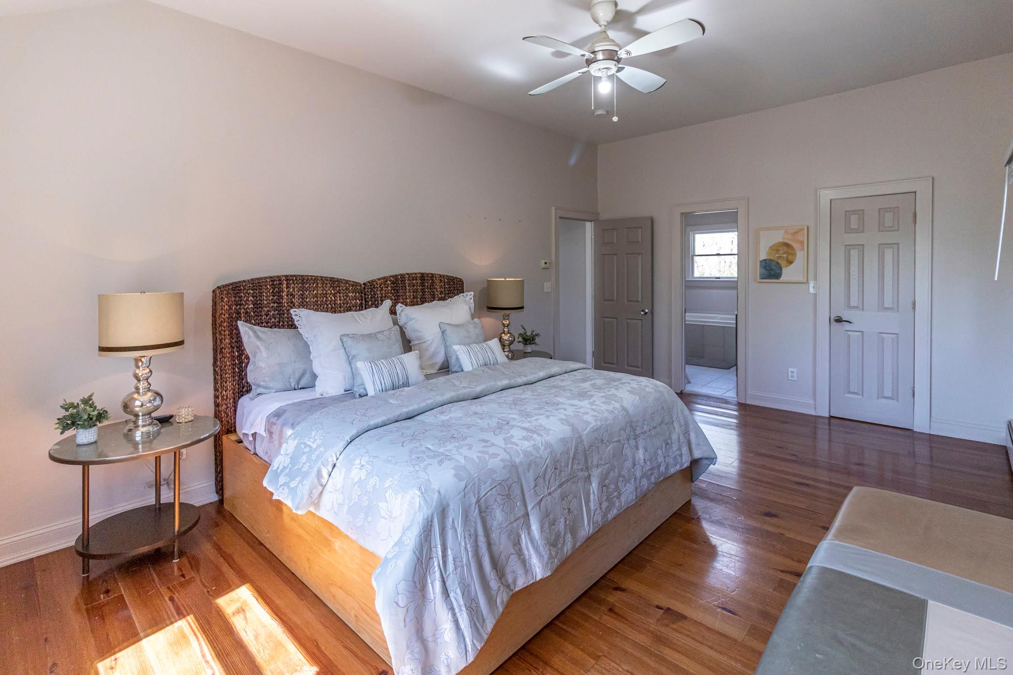 6 Bayview Terrace Hampton Bays, NY 11946 - Photo 26 of 36 Bedroom with wood-type flooring and ceiling fan