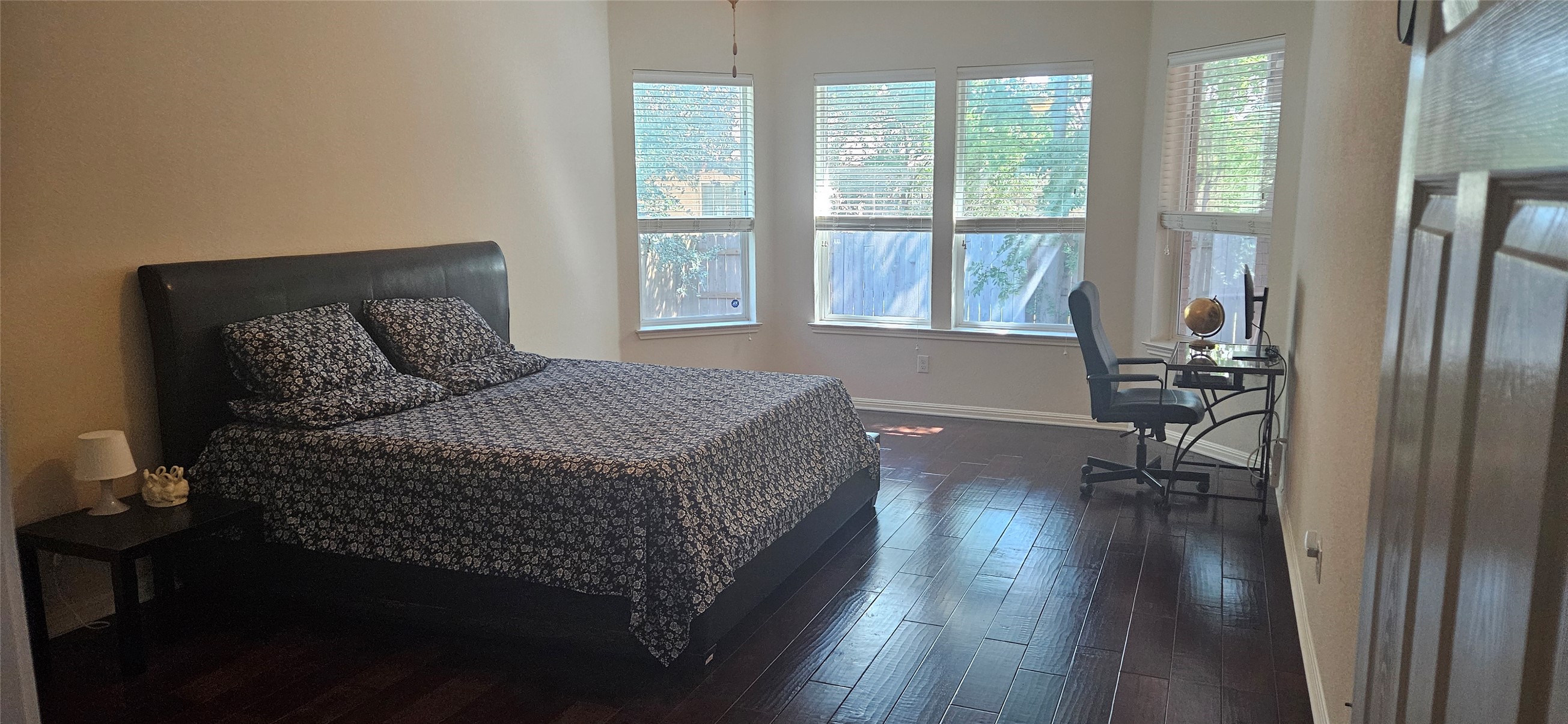 116 Azimuth Drive Austin, TX 78717 - Photo 15 of 33 a bedroom with a bed and wooden floor