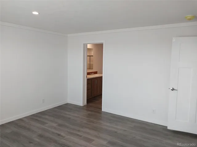 a kitchen with stainless steel appliances a stove a sink and a refrigerator