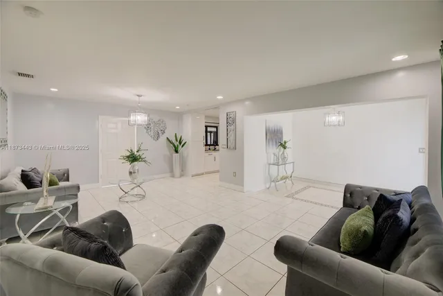 a living room with furniture and a couch