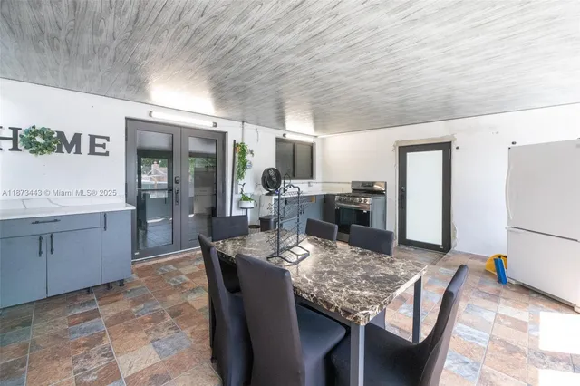 a view of a dining room with furniture