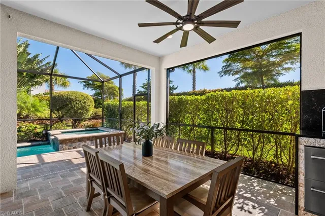 a view of an outdoor dining space with furniture