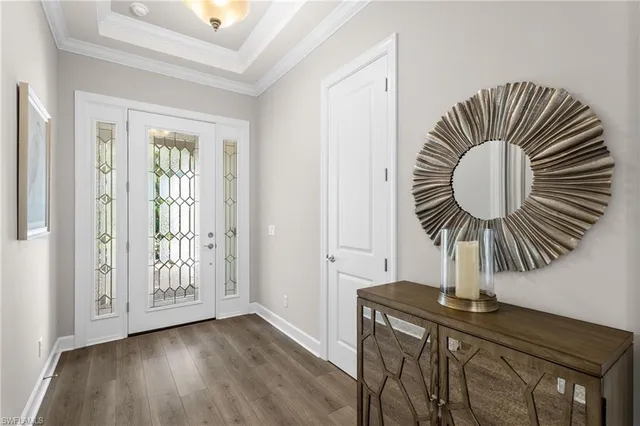 a view of entryway with wooden floor