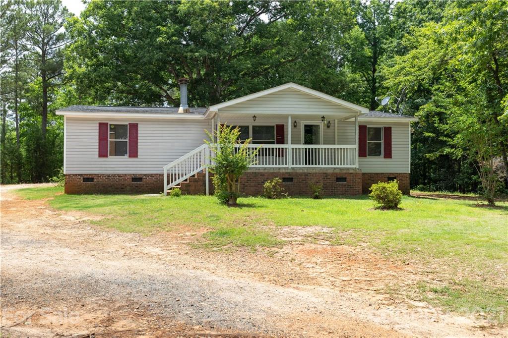 1581 Goings Road Chester, SC 29706 - Photo 1 of 27 a front view of a house with a yard