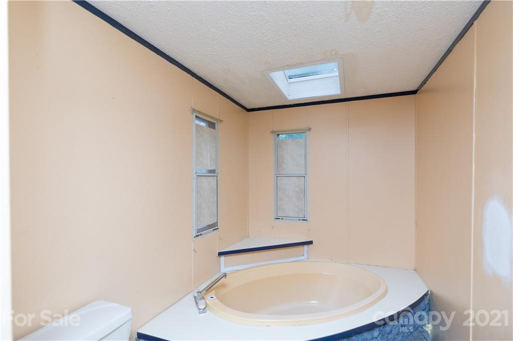 1581 Goings Road Chester, SC 29706 - Photo 11 of 27 a bathroom with a sink and a mirror