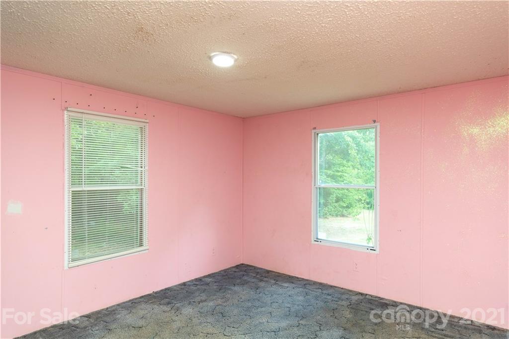 1581 Goings Road Chester, SC 29706 - Photo 14 of 27 an empty room with windows