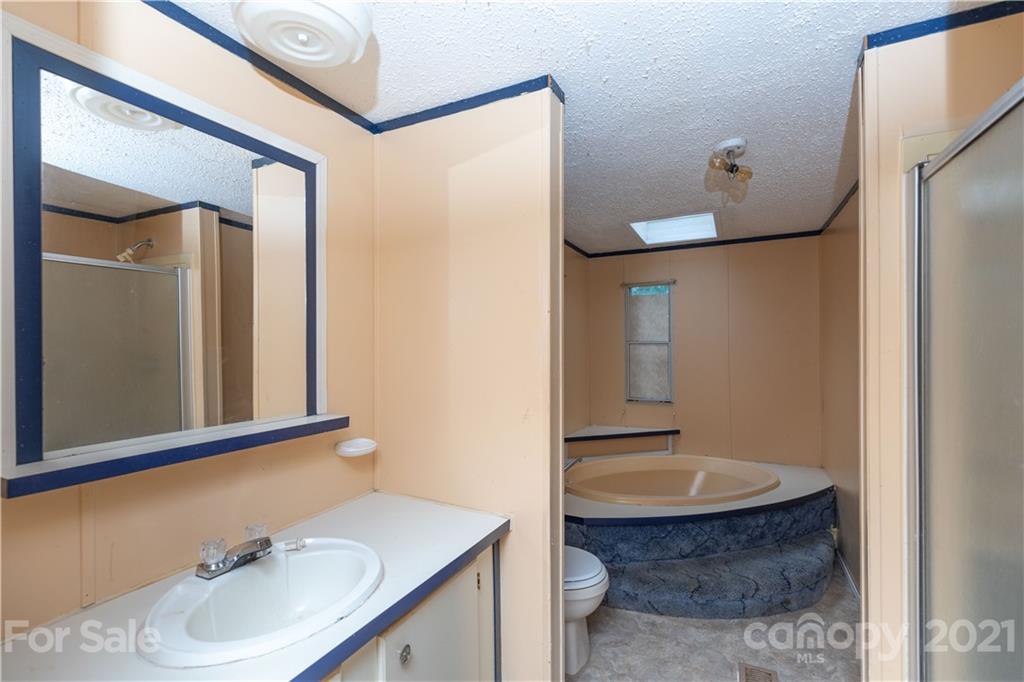 1581 Goings Road Chester, SC 29706 - Photo 10 of 27 a bathroom with a sink toilet and shower