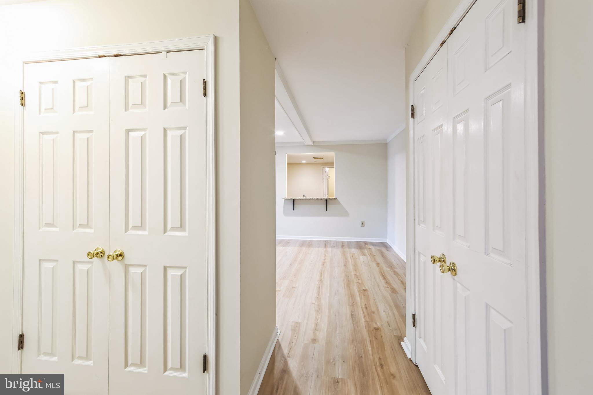 1804 Mountainview Drive, Unit 1804 Chesterbrook, PA 19087 - Photo 3 of 20 a view of a hallway with wooden floor and staircase