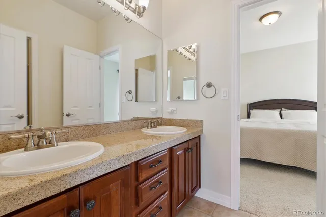 a living room with fireplace furniture and a flat screen tv
