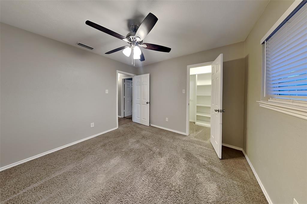 2705 South Colfax Circle Plano, TX 75075 - Photo 16 of 19 an empty room with closet and wooden floor