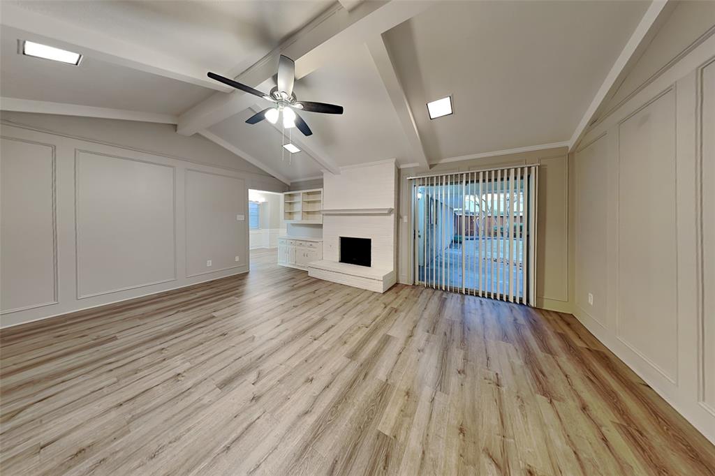 2705 South Colfax Circle Plano, TX 75075 - Photo 2 of 19 wooden floor in an empty room with a window