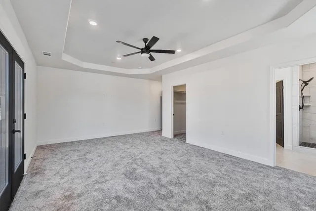 a bathroom with a double vanity sink and mirror