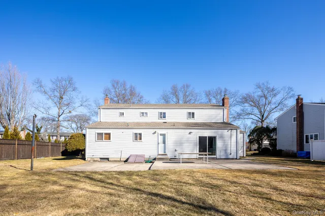 a view of a building with a yard