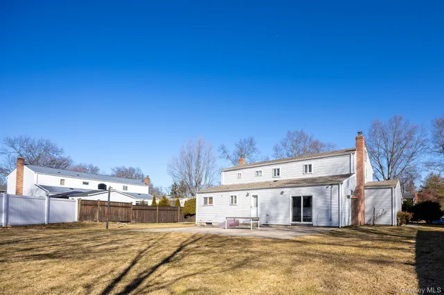 a view of a house with a big yard