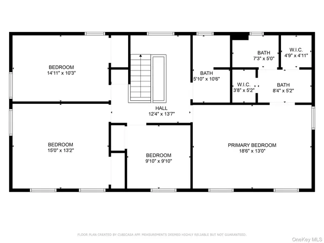 a picture of a bench in front of a wall