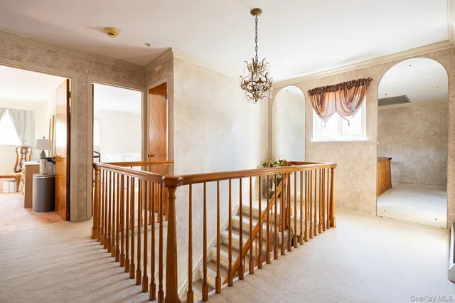 a view of a hallway with windows