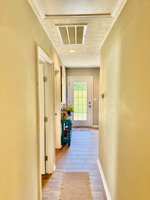 1316 Old Cowan Road Winchester, TN 37398 - Photo 13 of 23 a view of a hallway with wooden floor and a bathroom