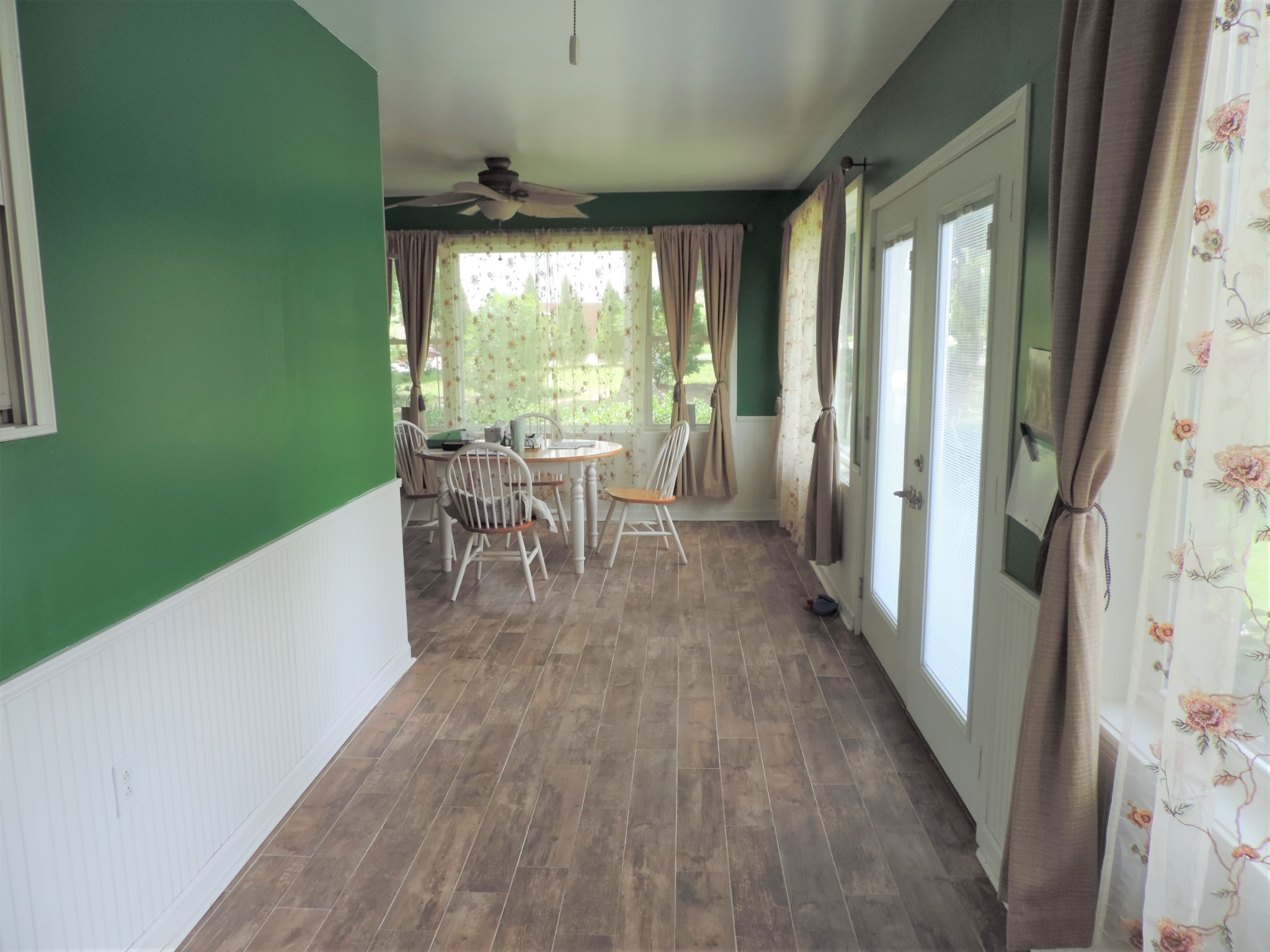 1849 Pinnacle Road Pleasant View, TN 37146 - Photo 56 of 61 a view of a dining room with furniture and wooden floor