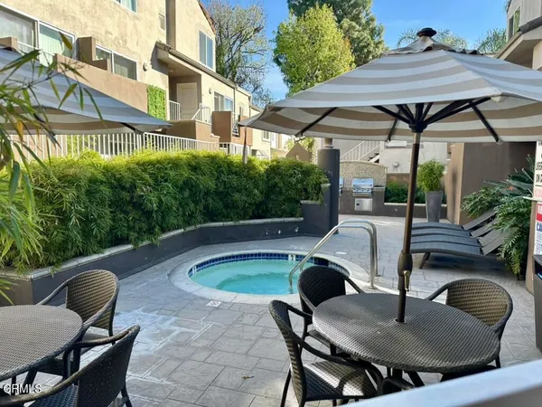 a view of yard with patio