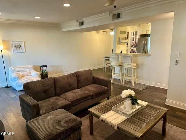 a kitchen with a sink stove and refrigerator