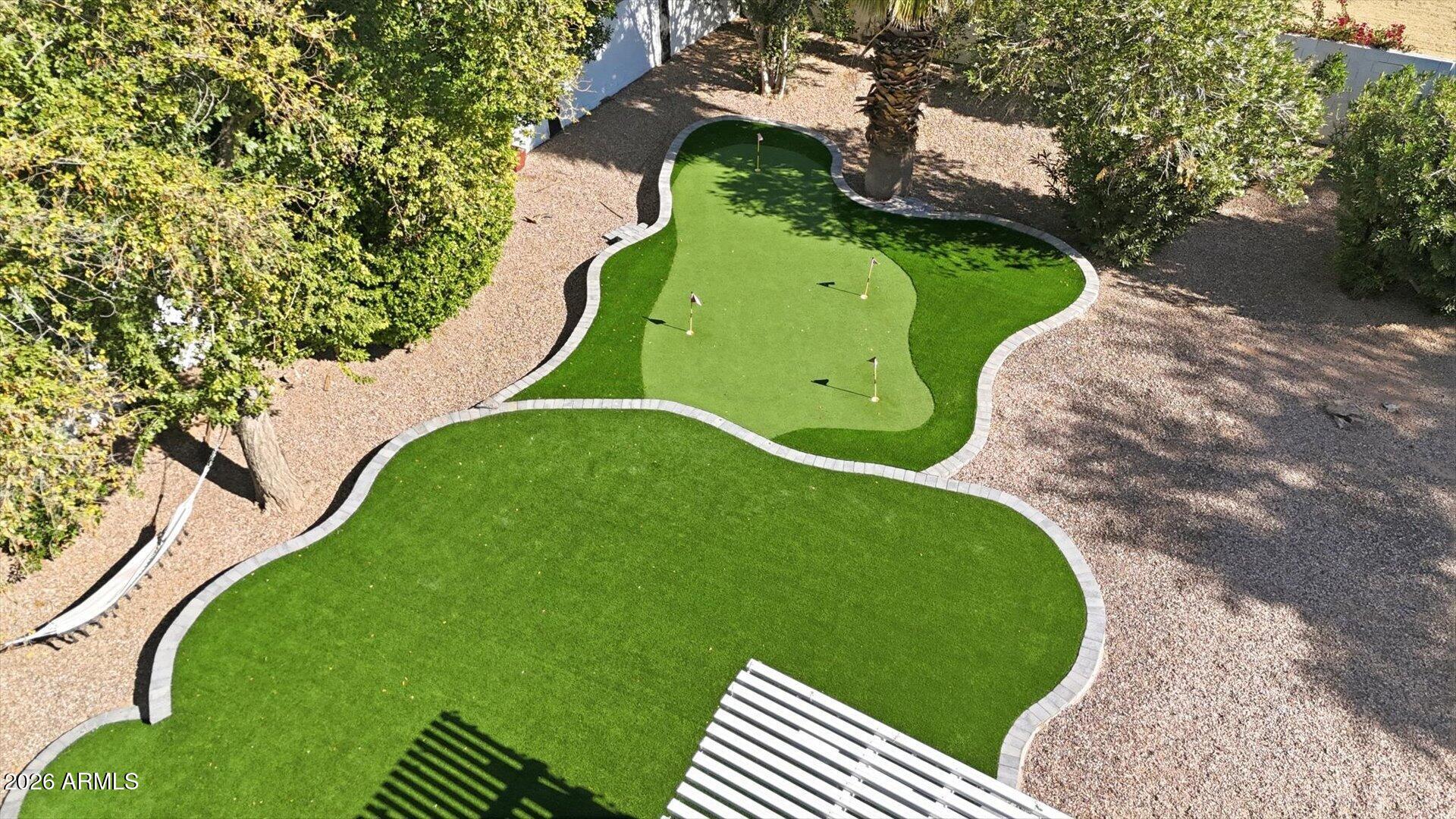 3166 East Morrison Ranch Parkway Gilbert, AZ 85296 - Photo 51 of 74 morrisonbackyardtrufandputtinggreen