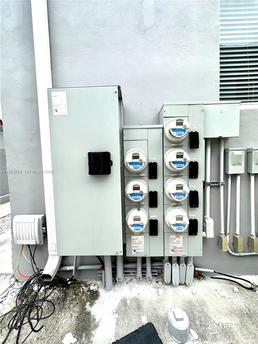 1684 Southwest 10th Street Miami, FL 33135 - Photo 13 of 14 view of living room with furniture and window