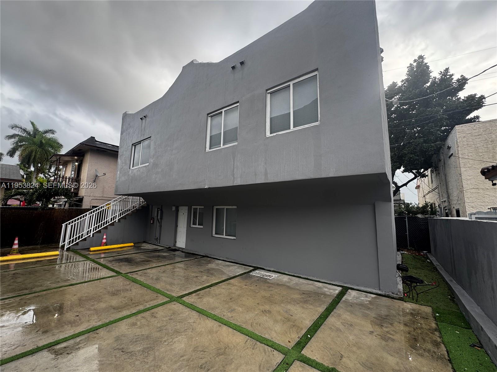 1684 Southwest 10th Street Miami, FL 33135 - Photo 3 of 14 a view of a house with a backyard