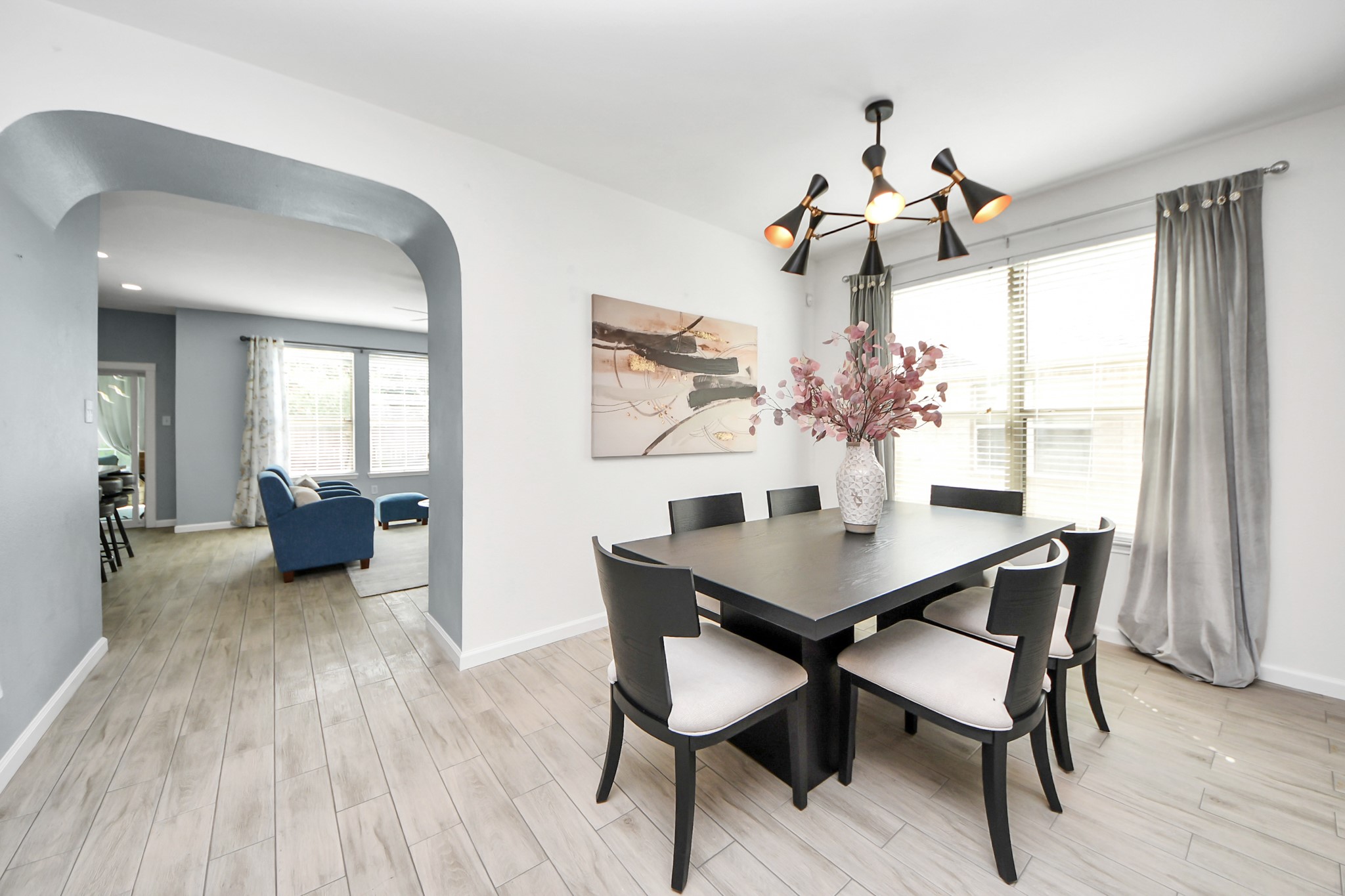 7619 Park Sage Lane Cypress, TX 77433 - Photo 11 of 48 a view of a dining room with furniture window and wooden floor