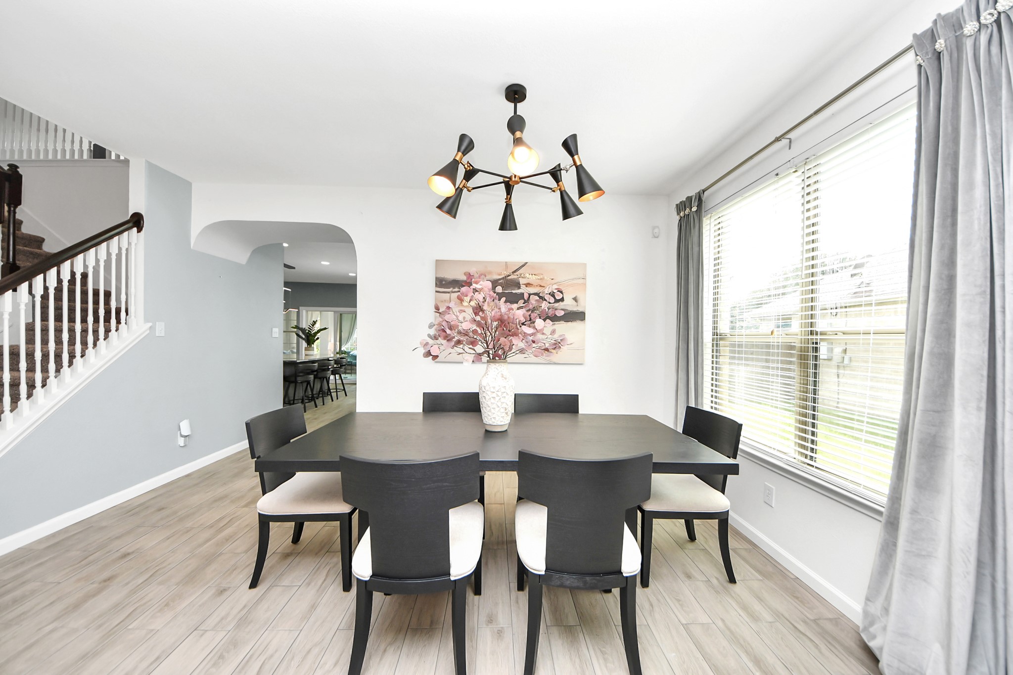 7619 Park Sage Lane Cypress, TX 77433 - Photo 12 of 48 a view of a dining room with furniture window and wooden floor
