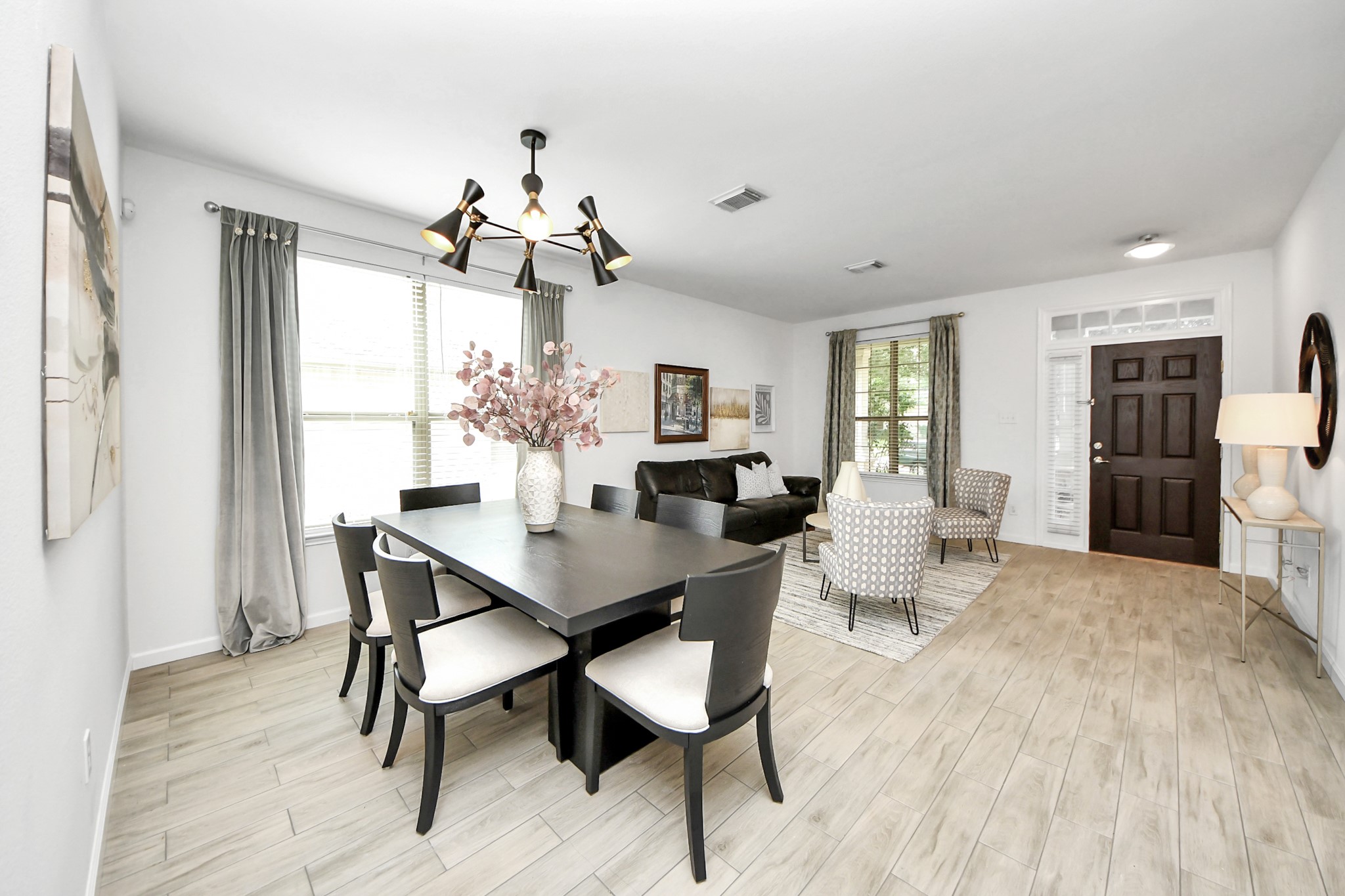 7619 Park Sage Lane Cypress, TX 77433 - Photo 14 of 48 a view of a dining room with furniture window and wooden floor