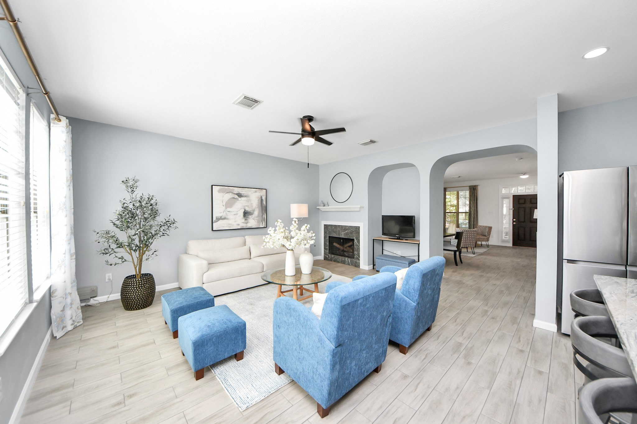 7619 Park Sage Lane Cypress, TX 77433 - Photo 17 of 48 a living room with furniture or chandelier and a wooden floor