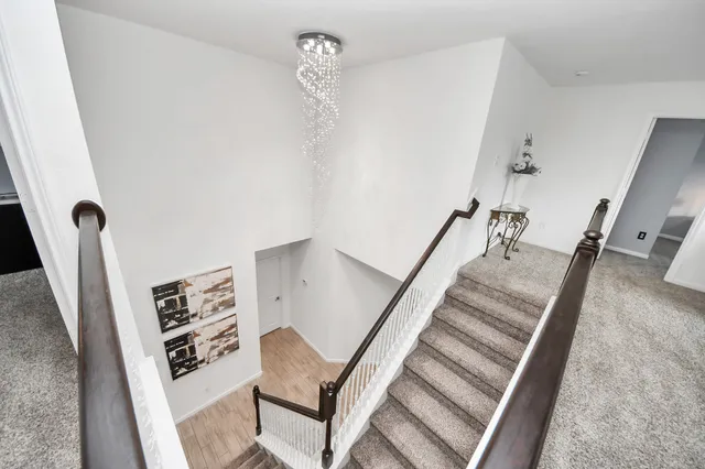 a view of staircase with furniture