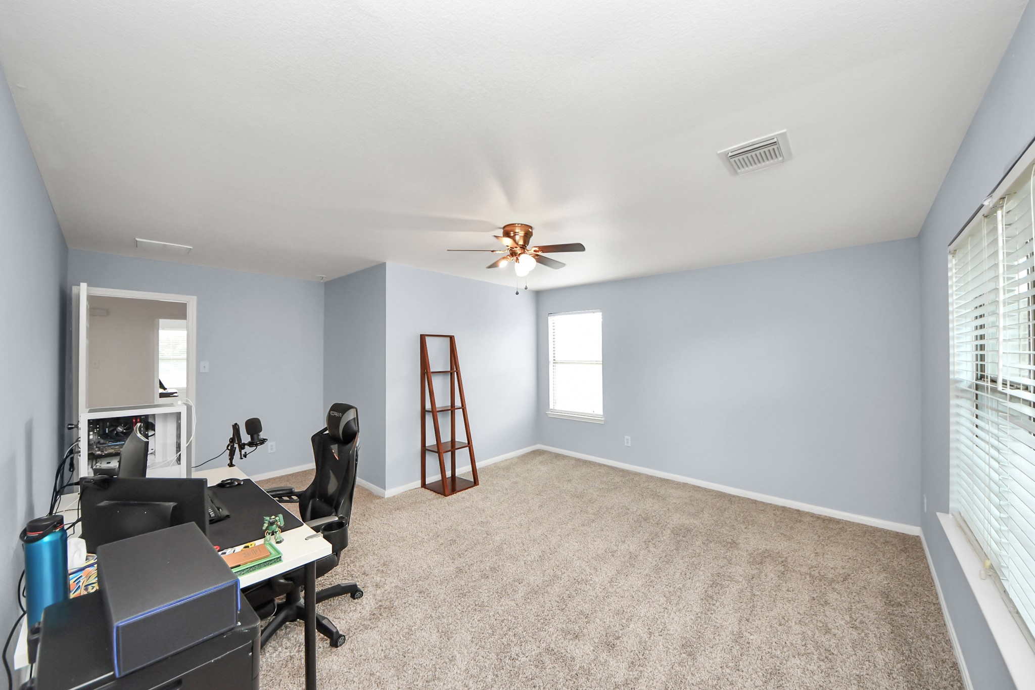 7619 Park Sage Lane Cypress, TX 77433 - Photo 42 of 48 a work room with furniture and a window