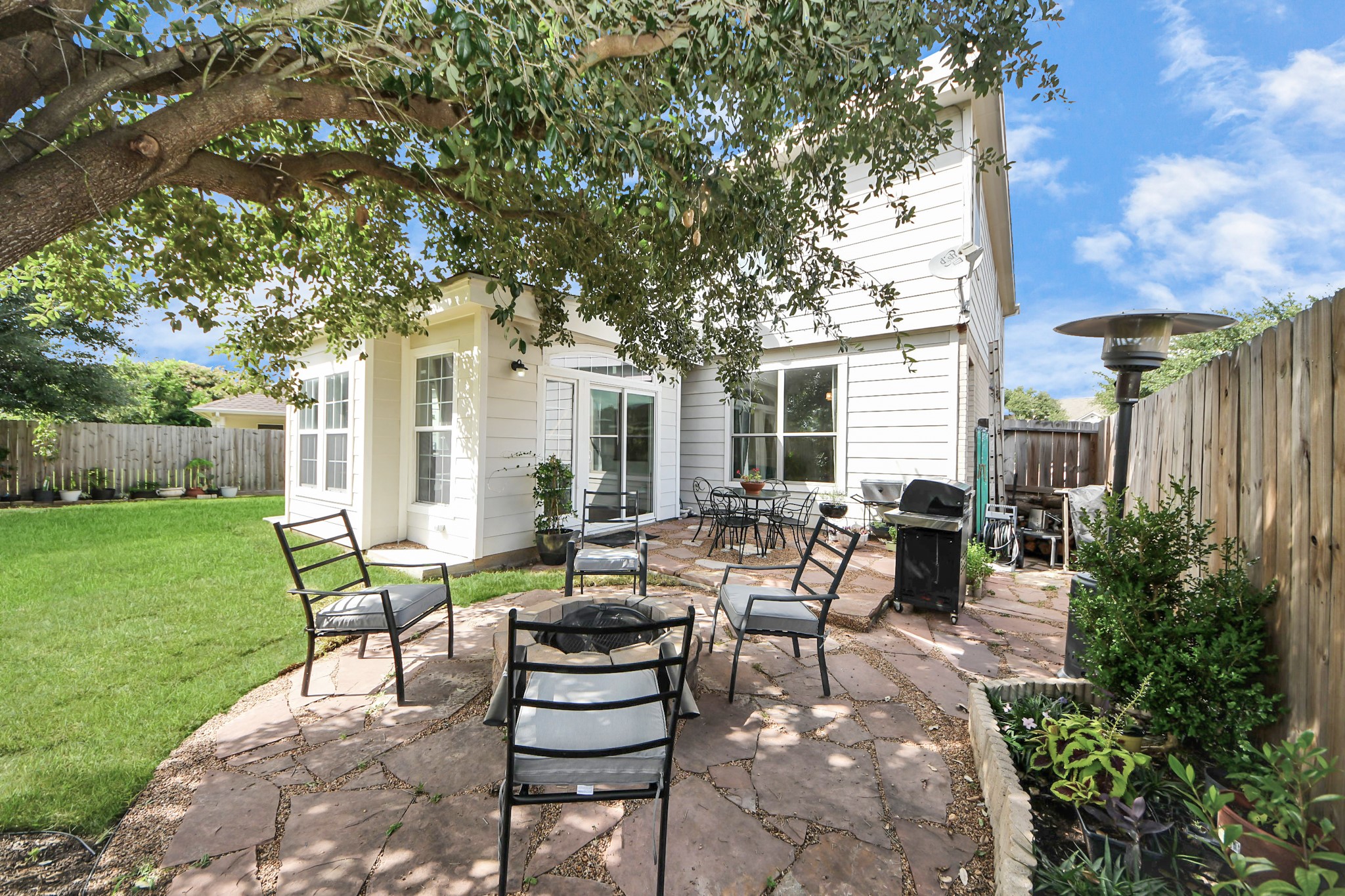 7619 Park Sage Lane Cypress, TX 77433 - Photo 46 of 48 a view of house with backyard and outdoor seating